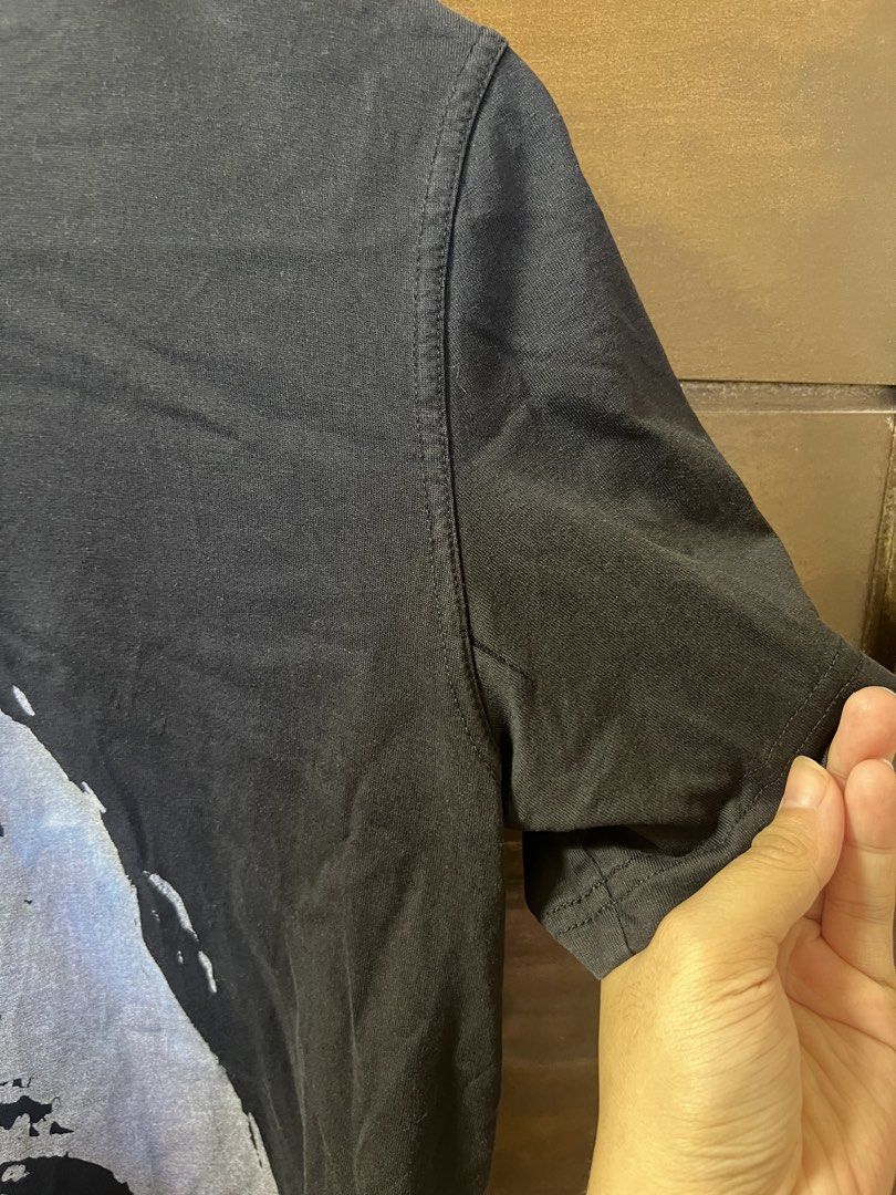 Givenchy Paris Shirt (Category: Tshirts & Polo Shirts ) located in Tarlac. Submitted by royal.ching (Listing ID 1465394607, Image 2). Description: GIVENCHY PARIS T-Shirt 🖤 Preloved | Used but not abused Selling this authentic-looking Givenchy shirt. Still in good overall condition and perfect for collectors or anyone who loves designer pieces. ✨ Details: * Givenchy Paris * Black T-shirt * Large shark graphic print * Preloved / used condition * S