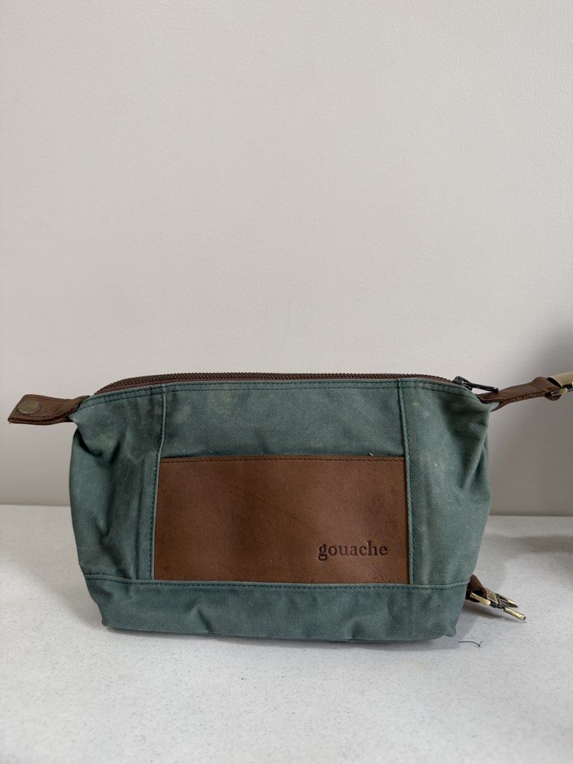 Gouache Colette Lunch Bag – Green (Category: Belt bags, Clutches and Pouches) located in Taytay. Submitted by thestyletwins (Listing ID 1465498224, Image 1). Description: Selling my Gouache Colette Lunch Bag in a muted green with brown leather details and antique brass hardware. Really nice classic/vintage-looking design that can be carried as a lunch bag or small everyday carry bag. * Insulated interior * Zip-top compartment * Adjustable shoulde