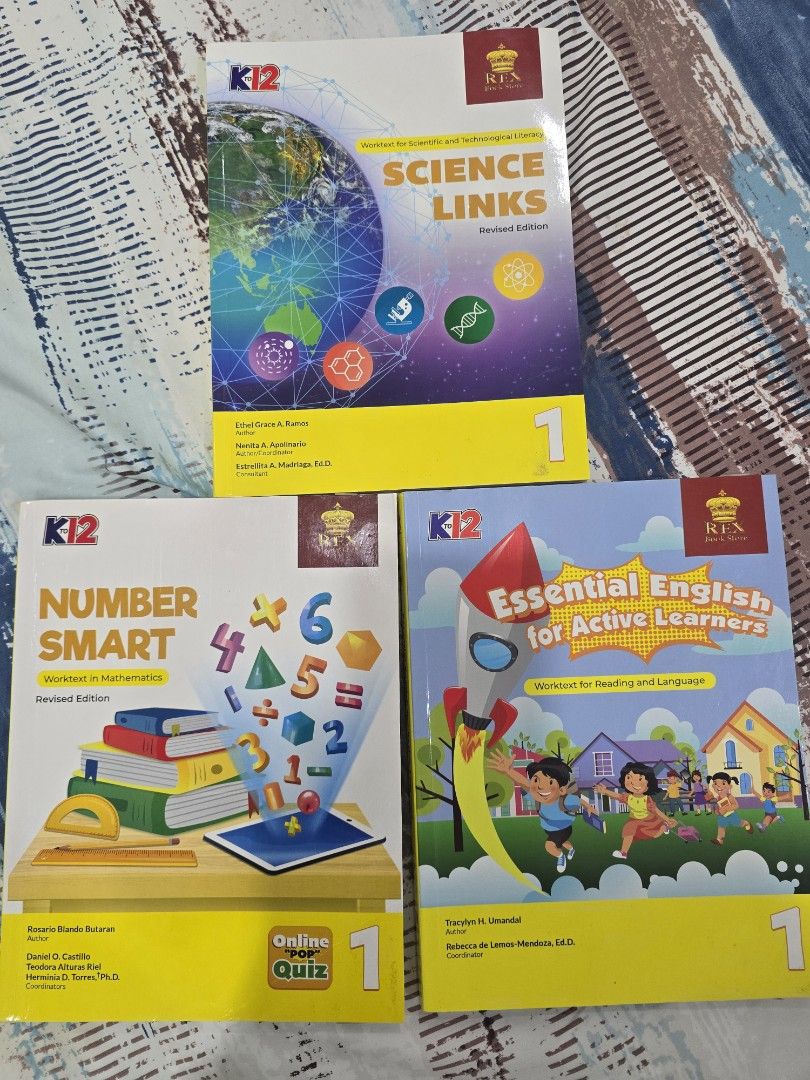 Grade 1 K to 12 Worktexts Set Mathematics Science English (Category: Textbooks) located in Cavite. Submitted by justforthrift (Listing ID 1465423640, Image 2). Description: 250 each book. Bundle of three Grade 1 worktexts from Rex Education. Includes Number Smart in Mathematics, Science Links, and Essential English for Active Learners. Covers core subjects for early elementary students. Clean pages, no writings inside. Published between 2020 and 