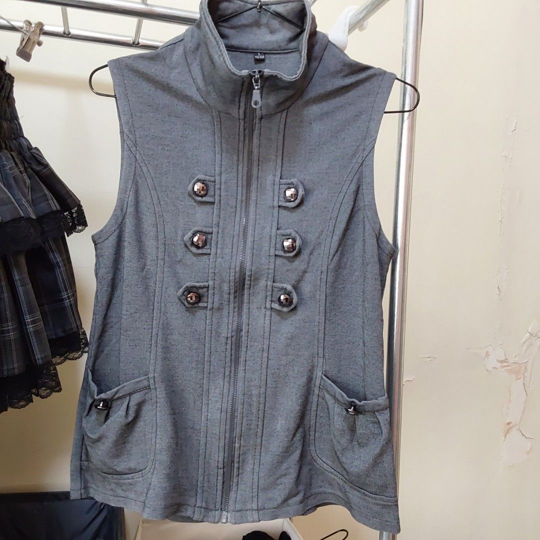 Gray sleeveless vest (Category: Others Tops) located in Magarao. Submitted by cinabonthrifts (Listing ID 1465447875, Image 1). Description: Highneck vest! Size: m MOP: Gcash MOD: Jnt.