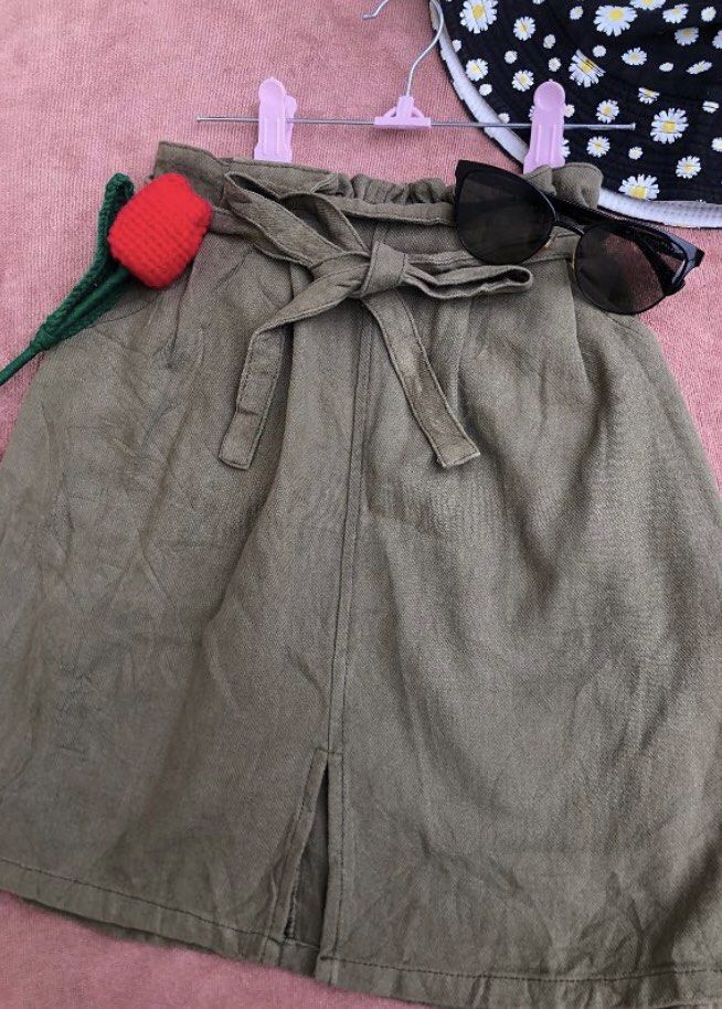 Green adjustable Skirt with tie (Category: Skirts) located in Manila. Submitted by cherub._. (Listing ID 1465516045, Image 1). Description: W 23-25 L 17.