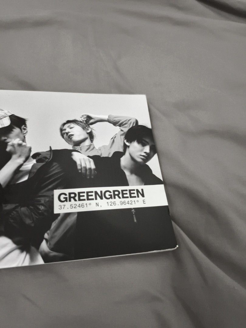 GREENGREEN Photobook (Category: Storybooks) located in Angeles City. Submitted by measaliman02351 (Listing ID 1465420793, Image 3). Description: - GREENGREEN photobook featuring members on the cover - Stylish coordinate text layout on the cover - Aesthetic black and white photography style inside - Clean binding with crisp, high-quality pages - Perfect addition to any fan collection - Condition: Brand new / Excellent.