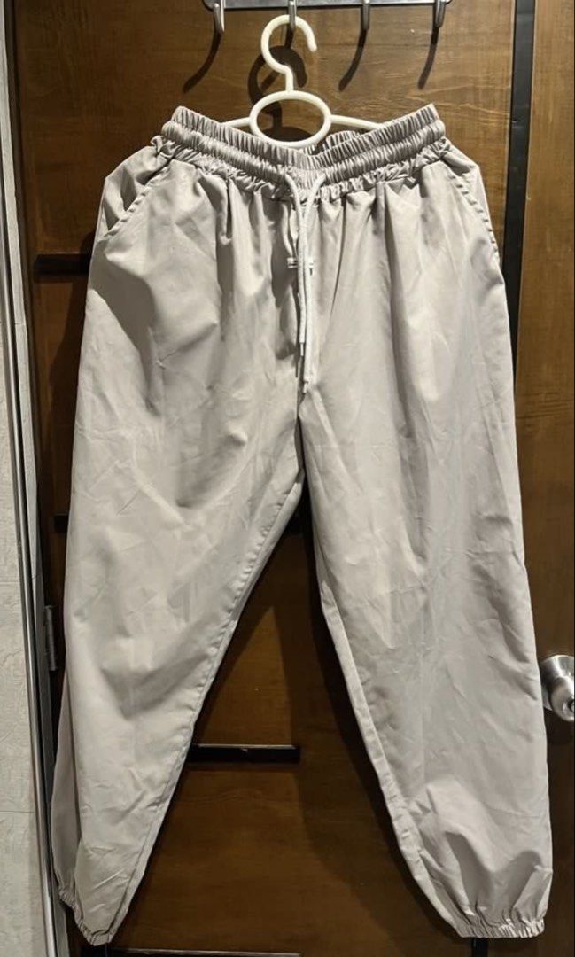 Grey Crop Zip Jacket and Jogger Pants Set (Category: Sets or Coordinates) located in Las Pinas. Submitted by francesaly (Listing ID 1465459443, Image 3). Description: - Matching grey two-piece set - Crop jacket: full zip, high collar, front flap pockets, drawstring hem, and puffed sleeves with elastic cuffs - Joggers: elastic waist, drawstring, side pockets, and cuffed ankles - Lightweight and versatile material (wear together or separately).