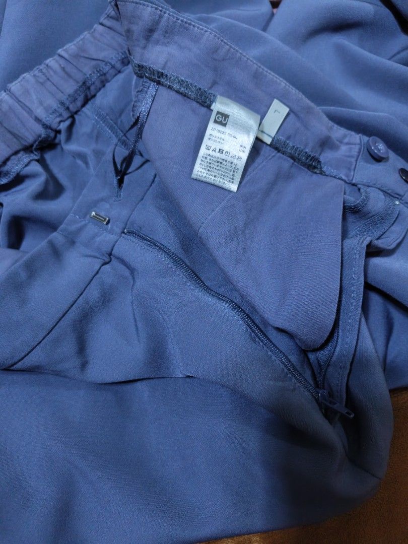 GU Blue straight cut Leg Pants Size L (Category: Jeans) located in Baguio. Submitted by jbv.ph (Listing ID 1465573469, Image 2). Description: - Brand: GU - Style: Wide leg pants - Color: Blue - Size: L (Brand new with tag attached) - Material: 90% polyester, 10% polyurethane - Features: Flat front design, elastic waistband at the back, functional side pockets - Condition: Clean, flawless, and great for everyday wear.