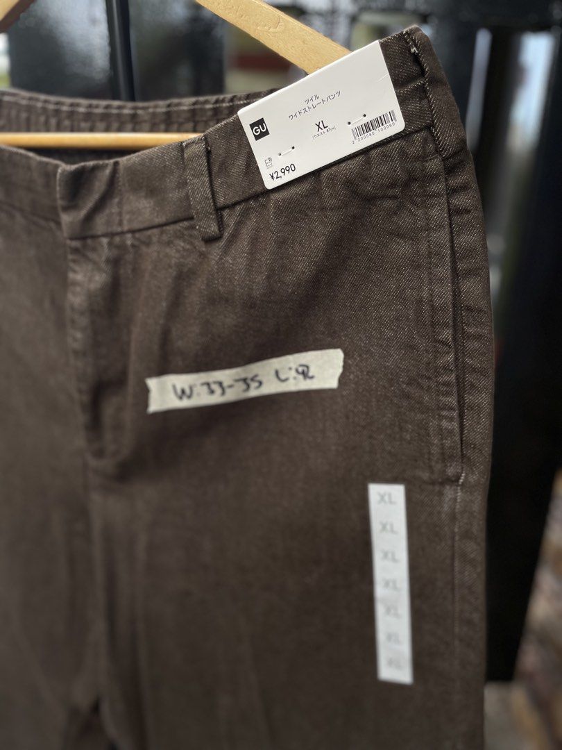 GU Twill Wide Straight Pants Brown (Category: Trousers) located in Baguio. Submitted by jomelcavit29012 (Listing ID 1465549440, Image 3). Description: GU Twill Wide Straight Pants Brown - Condition : 10/10 - Size : XL - Dimension : 33 - 34 / 42 - Price : 1280 - Style: Twill wide straight pants - Color: 37 Brown - Size: XL (Waist: 87cm) - Material: 100% Cotton - Condition: Brand new with original store tags (never worn) - Features: Relaxed fit, st