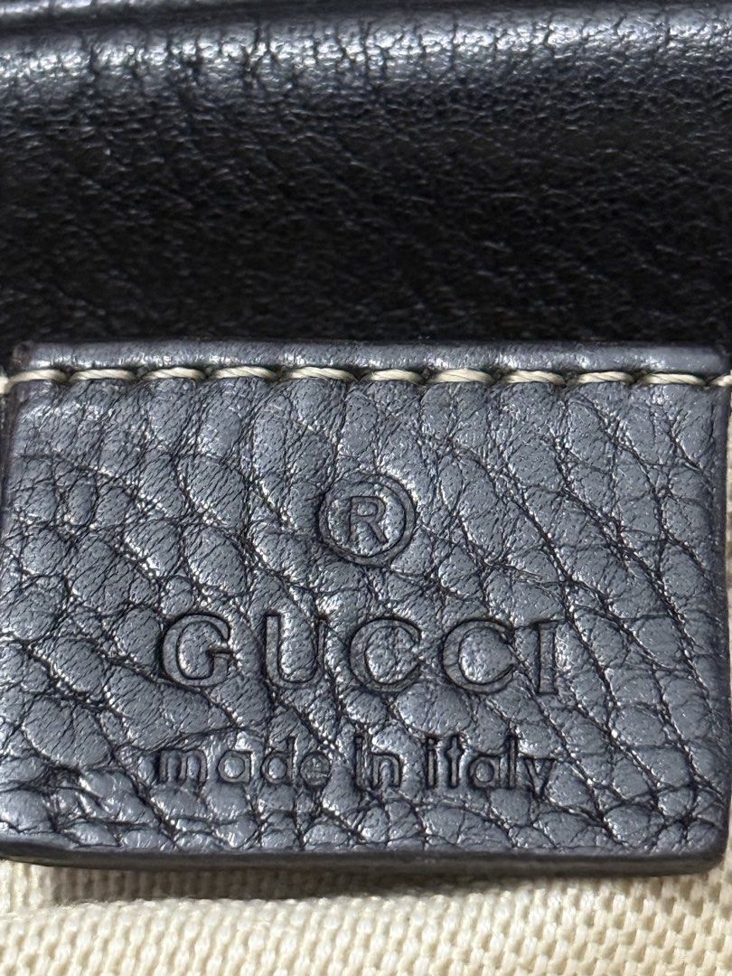 Gucci Black Leather Disco Bag (Category: Luxury Bags & Wallets) located in Manila. Submitted by bilog_khairmuchuan (Listing ID 1465402576, Image 2). Description: - Brand: Gucci - Model: Soho Disco Camera Bag - Material: Black grained/pebbled leather - Hardware: Intact, gold-tone - Features: Embossed interlocking G logo, playful leather tassel zip pull, adjustable crossbody strap - Interior: Light-colored fabric lining with serial number tag (3083