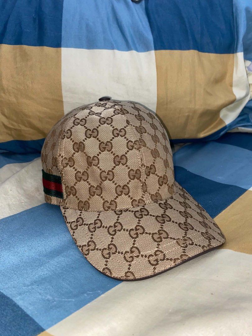 GUCCI GG BASEBALL CAP WITH WEB (Category: Caps & Hats) located in Manila. Submitted by rickserran22365 (Listing ID 1465485502, Image 2). Description: GG BASEBALL HAT W/ WEB 100% AUTHENTIC NOT USED , BOUGHT FROM US SIZE 59 LARGE 10/10 CONDITION 10/10 COLORWAY COMPLETE TAGS WITH SERIAL NUMBER NEGOTIABLE , SUPER BUDGET MEAL WORTH IT PRICE WELL USE. DM IF SURE BUYER ISSUE: NO BOX AND NO DUST BAG.