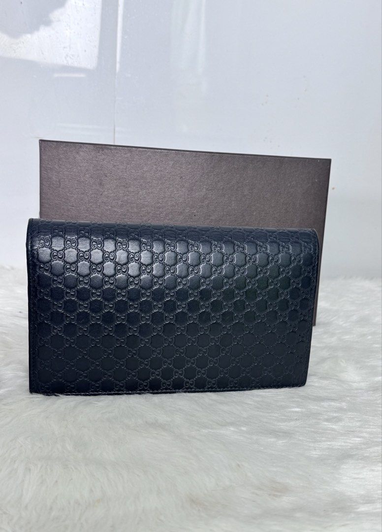 Gucci Micro Guccissima Wallet On Strap (Category: Cross-body Bags) located in Davao. Submitted by makeupbynoeh (Listing ID 1465522013, Image 3). Description: - P 28,500.xx (negotiable) - Authentic Gucci Micro Guccissima Wallet On Strap black - Snap button closure with a secure interior zip pocket - Versatile design: includes a removable strap to wear on the shoulder or carry as a clutch - Comes complete with the original Gucci box and dust bag - 