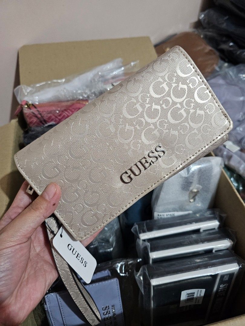 GUESS ABBAS Wallet (Category: Wallets & Card holders) located in Quezon City. Submitted by senyoramaria2 (Listing ID 1465557731, Image 1). Description: GUESS - Abbas Phone Organizer Wallet With sling #USpasabuy.