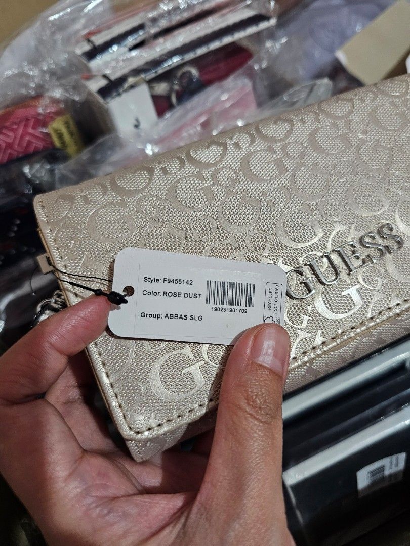 GUESS ABBAS Wallet (Category: Wallets & Card holders) located in Quezon City. Submitted by senyoramaria2 (Listing ID 1465557731, Image 2). Description: GUESS - Abbas Phone Organizer Wallet With sling #USpasabuy.