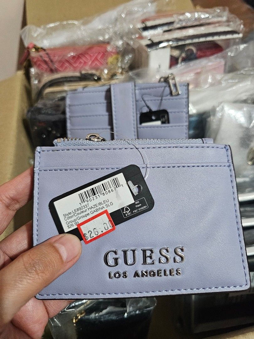 GUESS GABINA Snap Card Case (Category: Wallets & Card holders) located in Quezon City. Submitted by senyoramaria2 (Listing ID 1465555232, Image 1). Description: GUESS GABINA Snap Card Case / Holder 4 Card slots ( 1 front + 3 back) 1 Zippered compartment for folded bills or additional cards. 2 pcs available #USpasabuy.