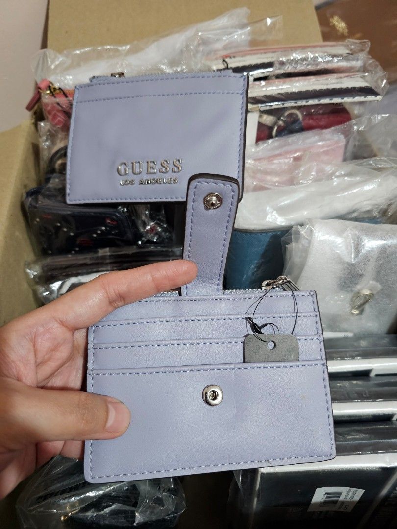 GUESS GABINA Snap Card Case (Category: Wallets & Card holders) located in Quezon City. Submitted by senyoramaria2 (Listing ID 1465555232, Image 3). Description: GUESS GABINA Snap Card Case / Holder 4 Card slots ( 1 front + 3 back) 1 Zippered compartment for folded bills or additional cards. 2 pcs available #USpasabuy.