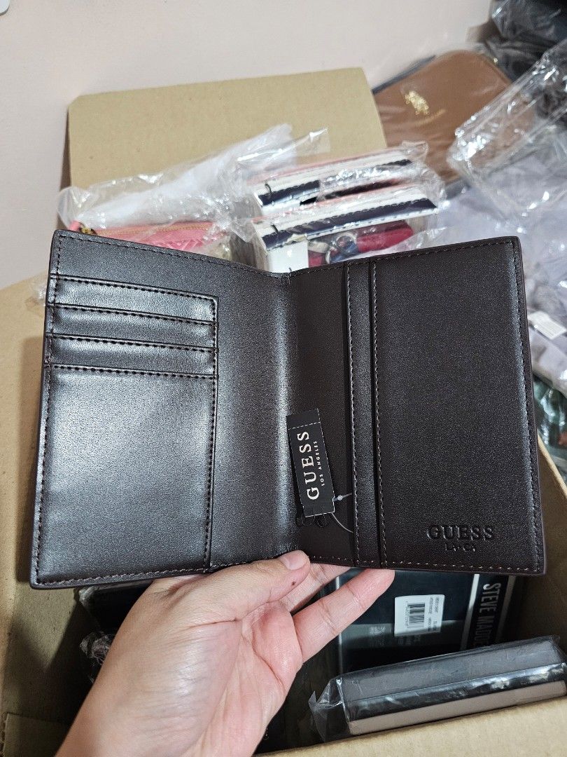 GUESS Passport Holder (Category: Wallets & Card holders) located in Quezon City. Submitted by senyoramaria2 (Listing ID 1465559609, Image 2). Description: GUESS Passport Holder #USpasabuy.