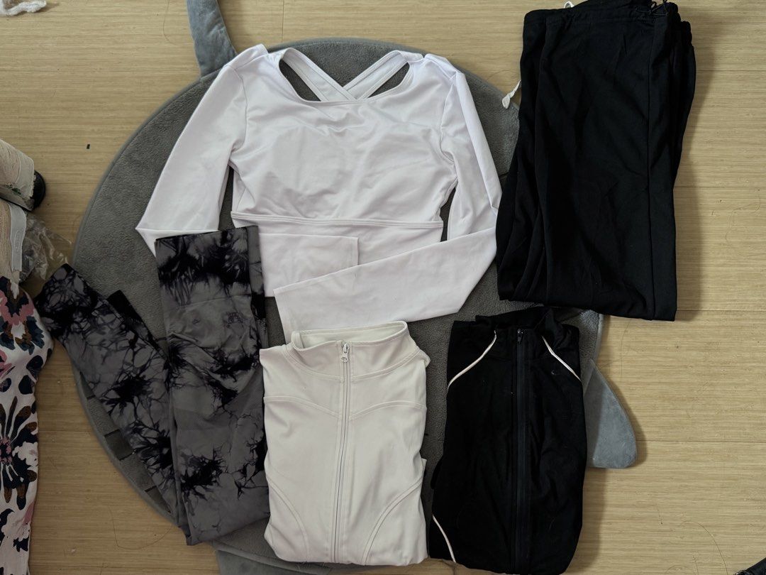 Gym Clothes As pack only (Category: Activewear) located in Manila. Submitted by purrrcloset (Listing ID 1465428786, Image 1). Description: 4 tops 1 sweats (and if mahanap ko yung gray dagdag ko na rin) 1 glutes lift leggings mahal rin bili ko each rfs— tight na sila sakin .