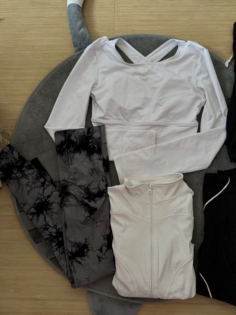 Gym Clothes As pack only (Category: Activewear) located in Manila. Submitted by purrrcloset (Listing ID 1465428786, Image 2). Description: 4 tops 1 sweats (and if mahanap ko yung gray dagdag ko na rin) 1 glutes lift leggings mahal rin bili ko each rfs— tight na sila sakin .