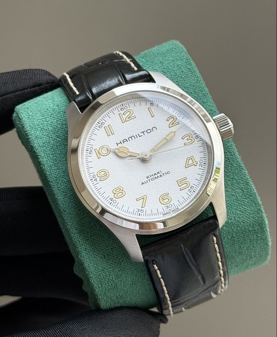 Hamilton Khaki Field Murph White 38mm (Category: Men's Watches) located in Pasig City. Submitted by kjeldran00 (Listing ID 1465388449, Image 3). Description: Hamilton Khaki Field Murph White 38mm Condition: 9.5/10 Inclusions: Outer Box, Watch Box, and Warranty Card -with Active Warranty until April 2027 Specifications: Automatic Movement Caliber: H-10 Case Diameter: 38mm Case Thickness: 11.1mm Case material: Stainless steel Sapphire Crystal Lumin