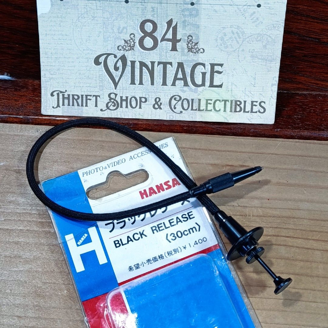 Hansa Japan Black Release Cable (Category: Other Photography Accessories) located in Las Pinas. Submitted by 84vintage (Listing ID 1465543570, Image 1). Description: 30cm just right even for medium or LF photography. Big finger rest assures better operation. Plus T and Hold modes lets you take longer bulb exposures without the hand strain..