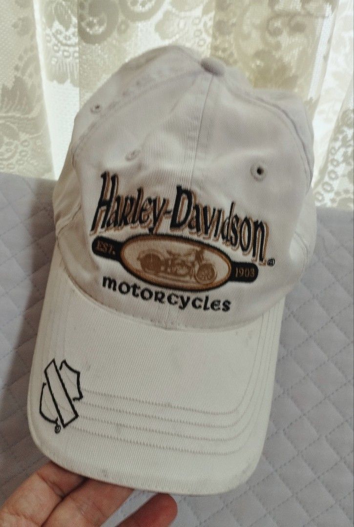 Harley-Davidson Maui Hawaii Baseball Cap White (Category: Caps & Hats) located in Baguio. Submitted by katgon2016 (Listing ID 1465445482, Image 1). Description: - Authentic Harley-Davidson cap from Maui, Hawaii - Features classic embroidered motorcycle graphic on the front and text embroidery on the back - Adjustable strap closure with branded patch for a custom fit - Official Global Products tag inside - Flaws: Shows some light discoloration and