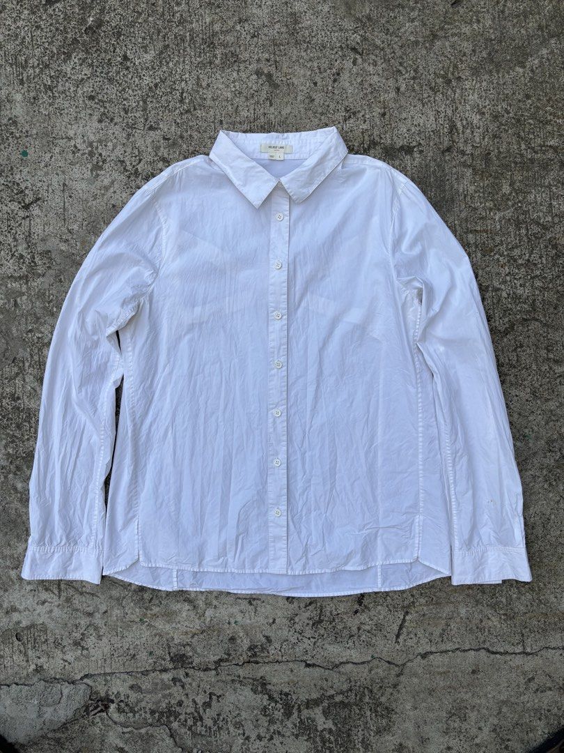 Helmut Lang White Long Sleeve Button Down Shirt Size L (Category: Longsleeves) located in San Pedro. Submitted by wharfthrift (Listing ID 1465444633, Image 1). Description: FOR SALE ‼️ Helmut Lang White Long Sleeve Button Down Shirt Size L GOOD CONDITION 9/10 ISSUE minimal stain check last photos (removable) SIZE 20 width 25 front length 27 back length 25 sleeves ₱3,000 + SF shipping via lalamove or j&t meet up around san pedro laguna or muntinlu