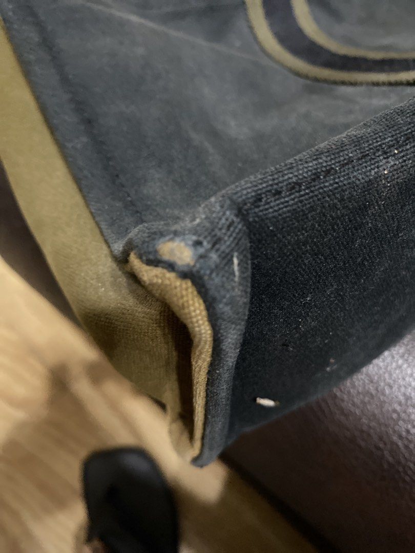 Hermes Fourre Tout Two-Tone Canvas Bag (Category: Tote Bags) located in Quezon City. Submitted by jamie_87 (Listing ID 1465450091, Image 3). Description: Rank D Price negotiable — PM me now! RLG: No budget for bag spa, decluttering too, and willing to sell it low * Olive green & dark blue two-tone canvas * Striped webbing handles, snap closures in palladium hardware(needs polishing) & spacious interior * Large front pocket * Minor scuffing/wear o