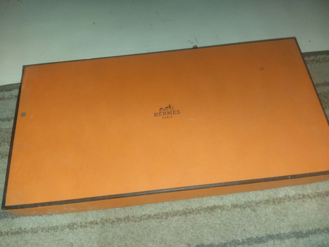Hermes Orange Box and Prada Box with Dust Bag (Category: Luxury Accessories) located in Manila. Submitted by kalvin19ch13504 (Listing ID 1465389163, Image 2). Description: - Authentic Hermes orange box and Prada box bundle - Includes one black Prada dust bag - Sturdy luxury packaging ideal for storage, display, or gifting - Clean overall condition - Kept carefully in a smoke-free home.