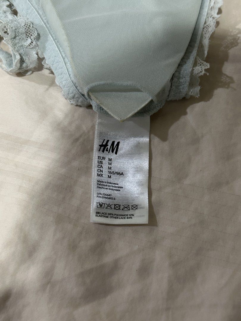H&M Light Blue Lace Bralette Size M (Category: Undergarments & Loungewear) located in Quezon City. Submitted by gentle_le (Listing ID 1465420940, Image 3). Description: Has light stains on left side (see photo) Original price: ₱899.