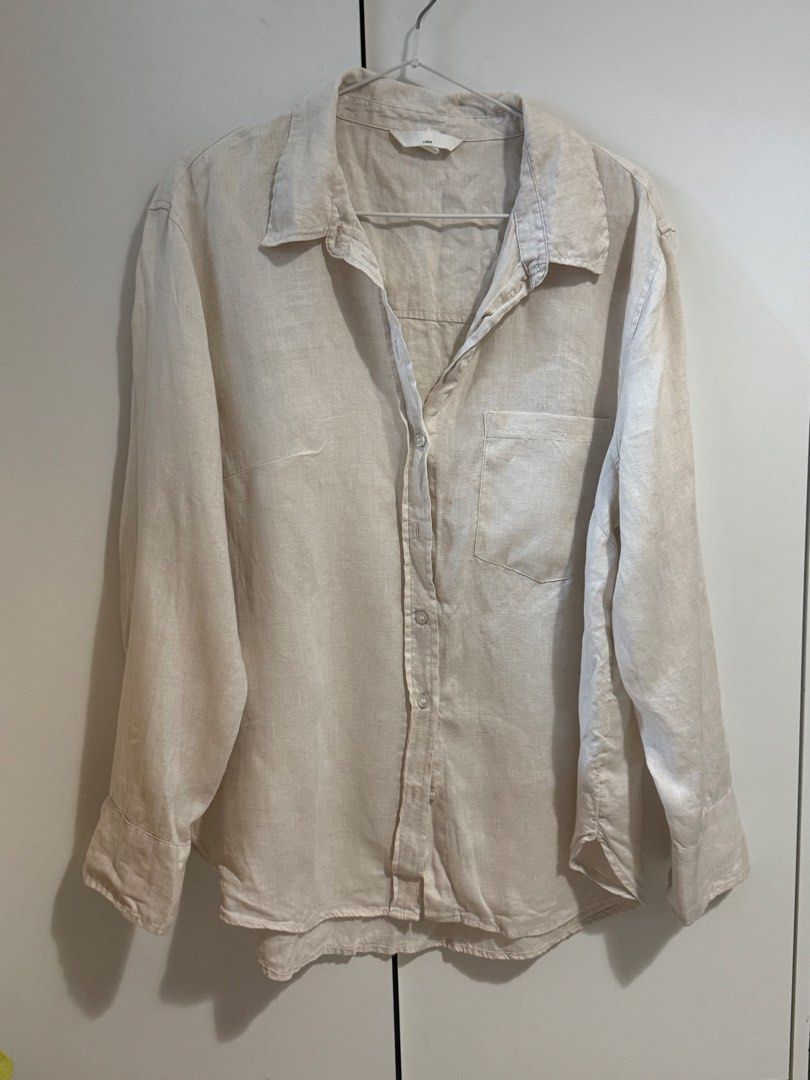 H&M Linen Button-Down Shirt (Category: Shirts) located in Mandaluyong City. Submitted by anj_declutters (Listing ID 1465398341, Image 1). Description: - Brand: H&M - Item: Linen long-sleeve button-down shirt - Color: Cream / Beige - Size: Large - Details: Single chest pocket, standard collar, relaxed & breezy fit - Condition: Great staple piece for warm weather or layering.