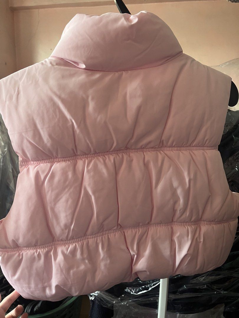 H&M Pink puff vest (Category: Coats, Jackets and Outerwear) located in Manila. Submitted by justshop.ph (Listing ID 1465544810, Image 3). Description: length 18in bust 36-37.