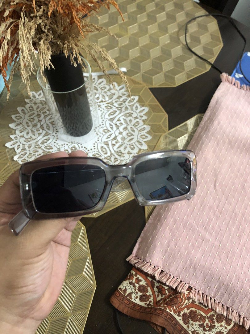 H&M sunglasses unisex (Category: Sunglasses & Eyewear) located in Lucena. Submitted by kweenritz (Listing ID 1465390551, Image 1). Description: Hi. Selling this H&M rectangular sunglasses in a Translucent gray frame with dark tinted lenses. No issue, good as new. With free pouch. Bought last summer at H&M SM north edsa branch. Orig price 890. Excellent condition, well-maintained Just Perfect for everyday wear, outdoor. 300 only plus shipping fee.