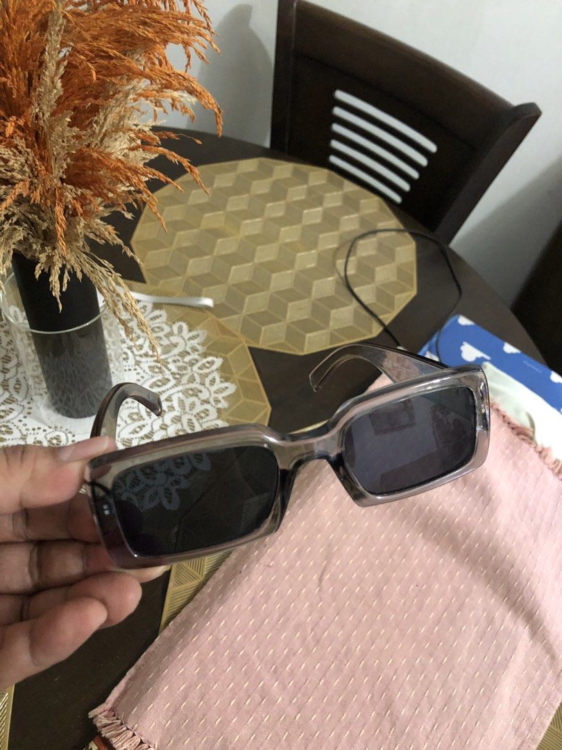 H&M sunglasses unisex (Category: Sunglasses & Eyewear) located in Lucena. Submitted by kweenritz (Listing ID 1465390551, Image 2). Description: Hi. Selling this H&M rectangular sunglasses in a Translucent gray frame with dark tinted lenses. No issue, good as new. With free pouch. Bought last summer at H&M SM north edsa branch. Orig price 890. Excellent condition, well-maintained Just Perfect for everyday wear, outdoor. 300 only plus shipping fee.