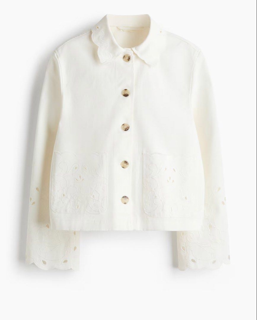 H&M White embroidered button up jacket (Category: Coats, Jackets and Outerwear) located in Paranaque City. Submitted by vestured.ph (Listing ID 1465540539, Image 1). Description: Washed only! Bought for 2,499 - Material: Comfortable white cotton-blend - Design: Cropped length with straight hem - Details: Horn-style front buttons - Accents: Scalloped embroidery on oversized collar, cuffs, and two patch pockets - Style: Great layering piece for coo