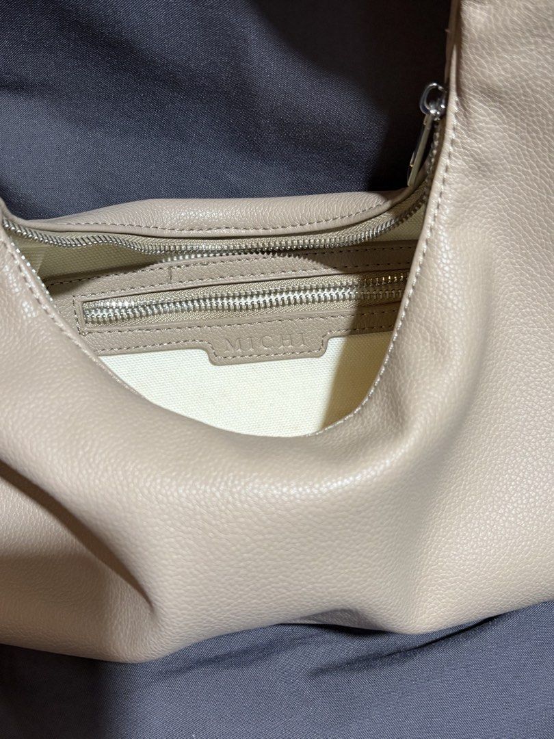 Hobo bag small Michi (Category: Shoulder Bags) located in Binan City. Submitted by aandrea.nicolee (Listing ID 1465396607, Image 2). Description: Color: Taupe Size:Width: 28cm*Height:20cm*Strap: 19cm Material: Pebbled leather Original price: ₱369.