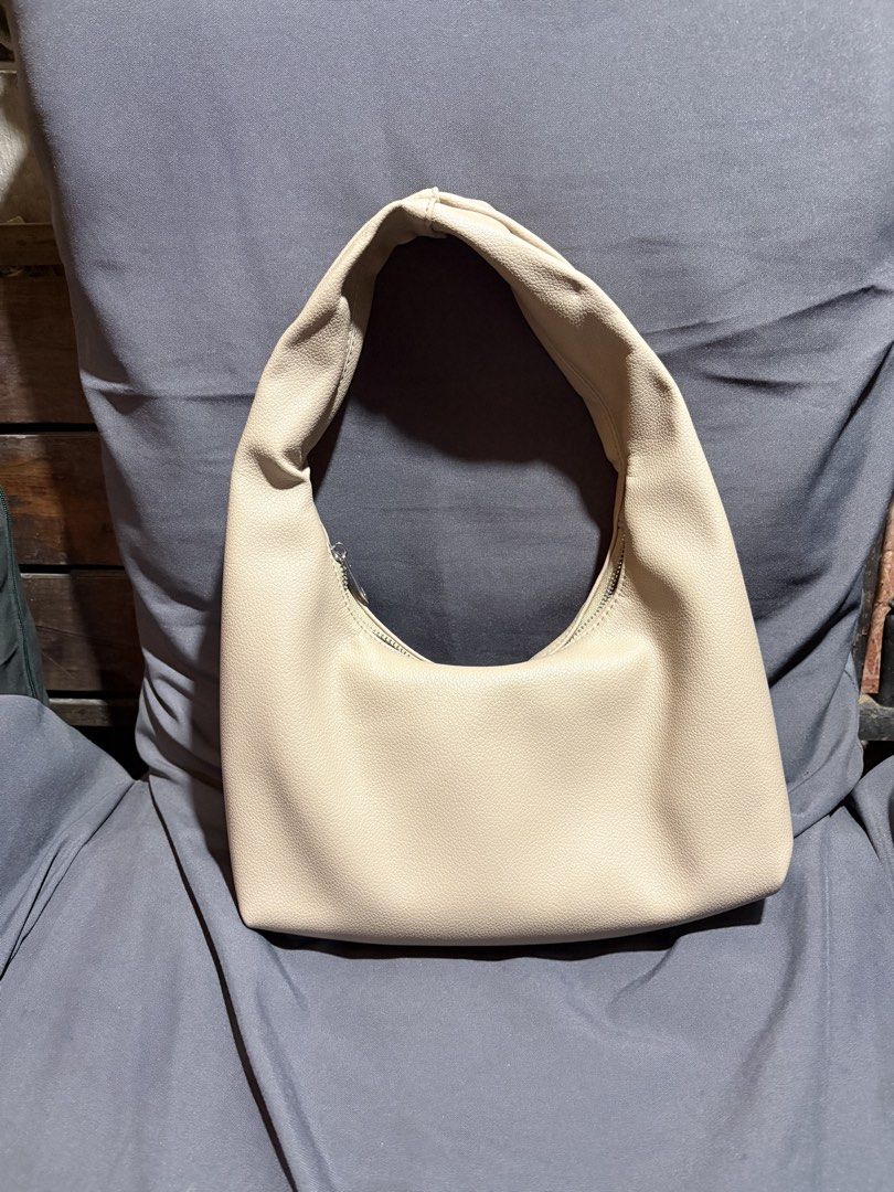 Hobo bag small Michi (Category: Shoulder Bags) located in Binan City. Submitted by aandrea.nicolee (Listing ID 1465396607, Image 1). Description: Color: Taupe Size:Width: 28cm*Height:20cm*Strap: 19cm Material: Pebbled leather Original price: ₱369.