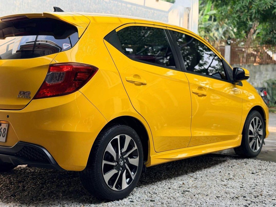 Honda Brio RS Auto (Category: Used Cars) located in Manila. Submitted by quality_cars (Listing ID 1465558262, Image 3). Description: FOR SALE! ‼2021 acq Honda Brio RS Automatic 28K Mileage ONLY — TOP OF THE LINE‼ 🔰59K DP ONLY!🔰 (1-3 Days Fast and Easy Approval) ✅Top-of-the-line RS Variant ✅28K Mileage ONLY! 1.2L i-VTEC Gasoline Engine CVT Automatic Transmission Sporty RS Body Kit LED Headlights with LED DRLs LED Front Fog Lamps 15-inch Two-Tone