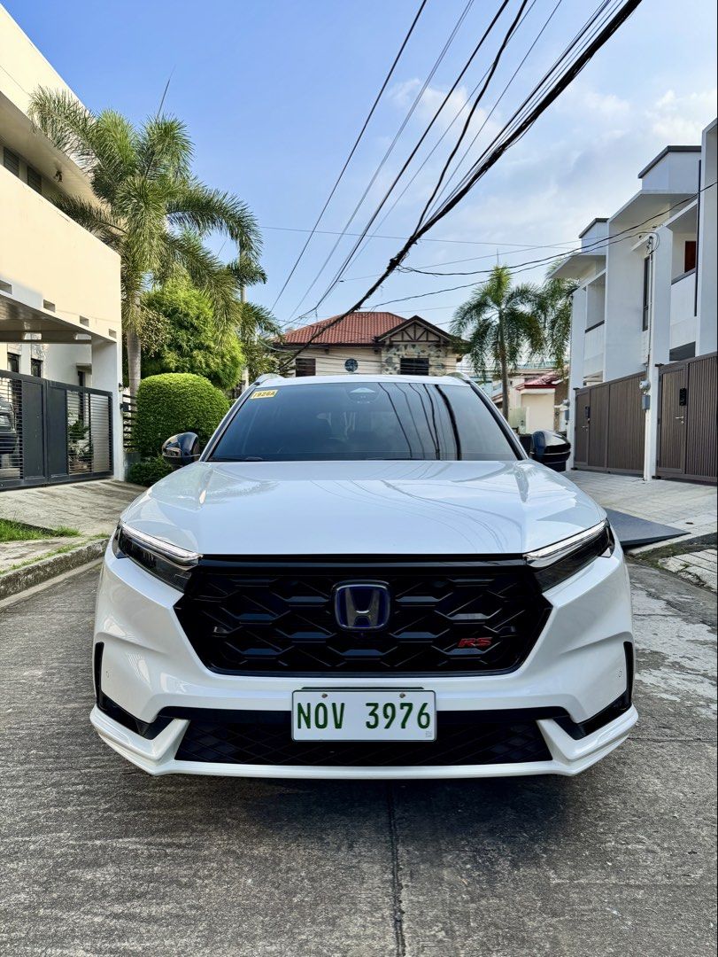 Honda CR-V RS HYBRID e-cvt Auto (Category: Used Cars) located in Paranaque City. Submitted by jrucars (Listing ID 1464703619, Image 1). Description: 2025 Honda CRV RS HEV E-CVT Automatic transmission 1st owned Top of the line All leather interior Panoramic moon roof Honda sensing Full casa maintained Insured upto 2027 Coding exempt All original Price:₱2,168,000 Accepts trade in and financing 493k all-in dp 5yrs 48,386 4yrs 55,998 3yrs 69,614 2yrs