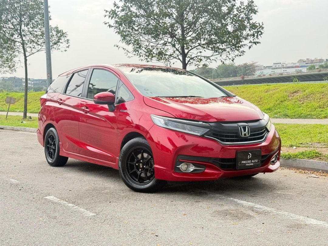 Honda Shuttle Hybrid 1.5 [2017 FL] (A) (Category: Used Cars) located in Singapore. Submitted by preciseauto (Listing ID 1465417417, Image 1). Description: 🔥🔥BOSS SAY ALL MUST GO CLEARANCE SALE🔥🔥 🚨CHEAPEST CARS IN THE MARKET🚨 🚘$500 DRIVEAWAY🚘 🏦LOWEST INTEREST FROM 1.48%🏦 🟢1 YEAR WARRANTY🟢 🔧FREE 1 YEAR SERVICING🔧 🏬 Vehicle 120 Points INSPECTION CHECK By In House Workshop BEFORE we put them for SALE 🚕 PHV Drivers Welcomed 🔁 High Tra