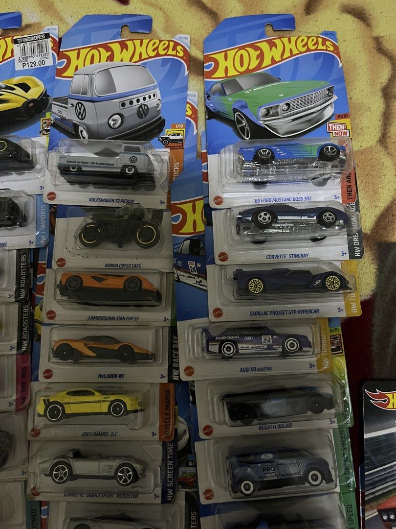 Hot Wheels Assorted Diecast Cars Lot (Category: Vehicle & Diecast Models) located in Manila. Submitted by djomari20631060 (Listing ID 1465528367, Image 3). Description: - Huge collection of Hot Wheels mainline and premium cars - Features top models: Lamborghini Huracan Sterrato, Bugatti Bolide, Ford Mustang, Porsche, Audi, and more - Assorted mix of sports cars, trucks, and classics - Condition: Brand new, unopened in original blister packaging -