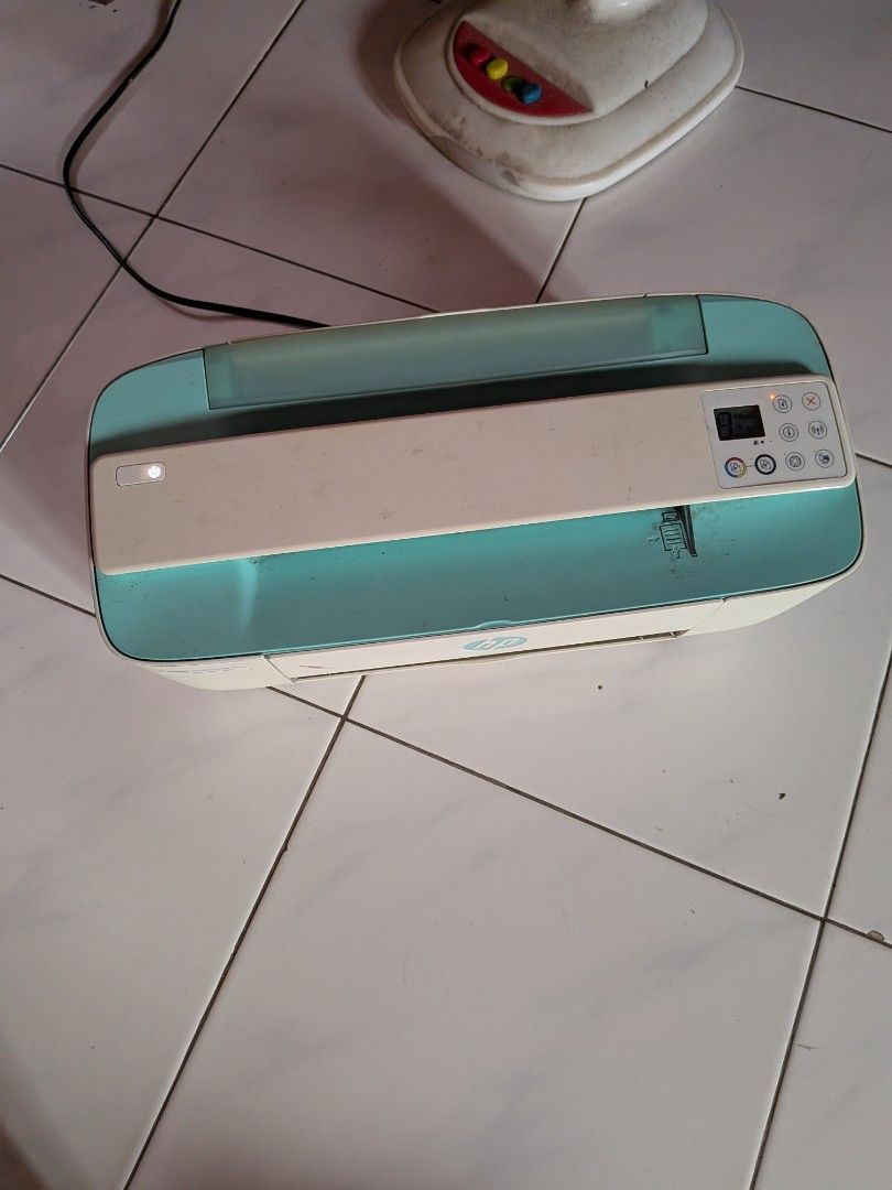 HP DeskJet Ink Advantage 3776 Printer (Category: Printers, Scanners & Copiers) located in San Jacinto. Submitted by jigssaw (Listing ID 1465455530, Image 3). Description: - Model: HP DeskJet Ink Advantage 3776 All-in-One Printer - Functions: Print, scan, copy, and web-enabled - Design: Compact white and turquoise body with top-right control panel and white backlit power button - Condition: Minor scuffs and dust marks, fully functional - Perfect f