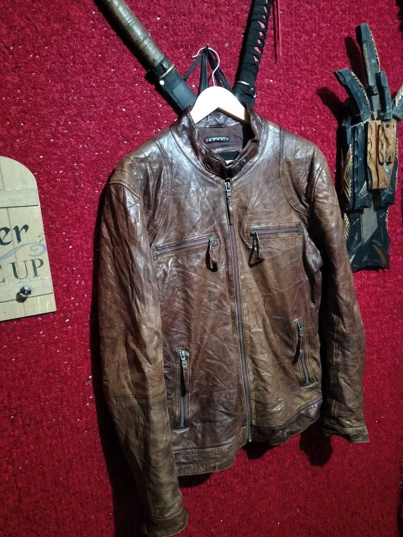 INFINITY DISTRESSED BROWN CAFE RACER LEATHER JACKET FOR MEN'S (Category: Coats, Jackets and Outerwear) located in Baguio. Submitted by vertex_nga.pow (Listing ID 1465573894, Image 3). Description: INFINITY DISTRESSED BROWN CAFE RACER LEATHER JACKET FOR MEN'S MEDUIM LARGE DIMENSION 27L BY 22 ARMPIT TO ARMPIT 18.5 INCHES SHOULDER TO SHOULDER 25 INCHES SLEEVE SHEEPSKIN/SCHAF LEATHER GOOD CONDITION BAGUIO LOCATION PLUS SF SA MALAYU JNT COURIER PASS C