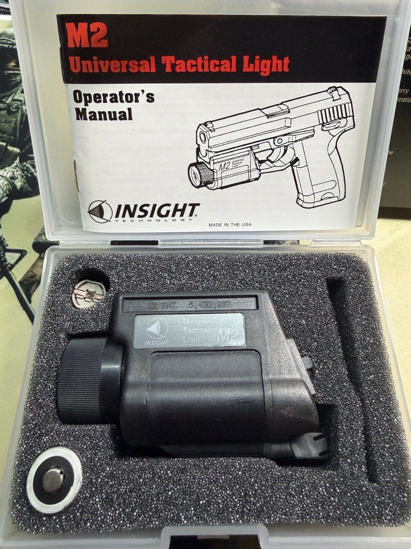 Insight Technology M2 UTL Universal Tactical Light (Category: Lighting) located in Makati City. Submitted by grandfox.ac2878 (Listing ID 1465384194, Image 1). Description: Insight Technology M2 UTL Universal Tactical Light for Heckler and Koch USP and USP Compact pistols. 90+ lumens white light output, polymer chemical resistant body, standard 6-volt system. Includes original storage case, operator manual, and original retail box..