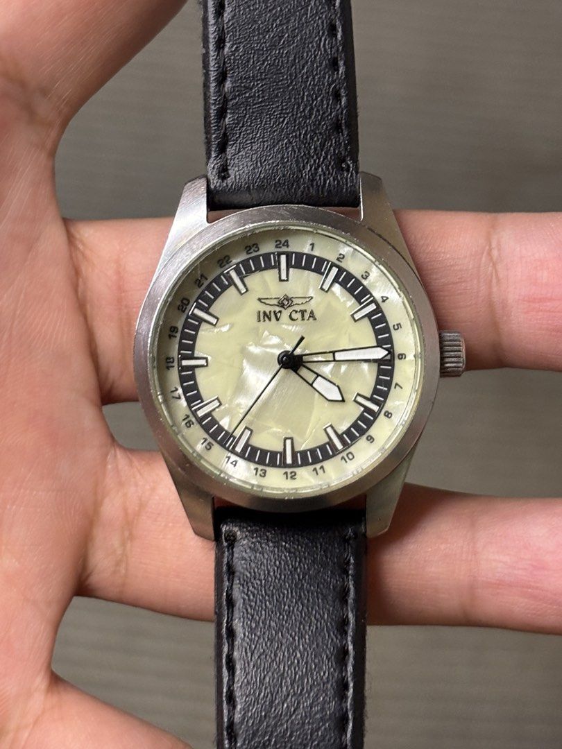 Invicta Specialty Collection MOP (Category: Men's Watches) located in Manila. Submitted by soughtafterseconds (Listing ID 1465547932, Image 1). Description: Invicta Specialty Collection MOP This Invicta Specialty Collection “Mother-of-Pearl / 24-Hour Military Track” Quartz Watch (Ref. 17098) is a tactical-meets-dress style piece featuring a shimmering shell face framed by military-time indexing. The face features a genuine Natural White Mother-of