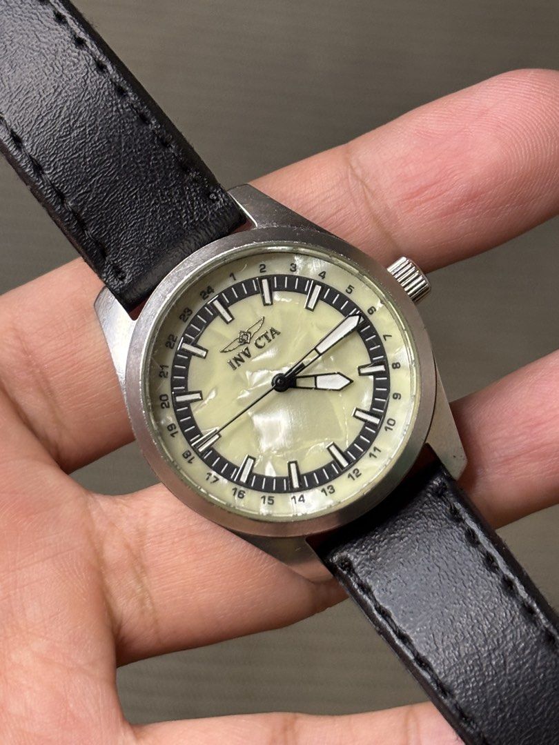 Invicta Specialty Collection MOP (Category: Men's Watches) located in Manila. Submitted by soughtafterseconds (Listing ID 1465547932, Image 2). Description: Invicta Specialty Collection MOP This Invicta Specialty Collection “Mother-of-Pearl / 24-Hour Military Track” Quartz Watch (Ref. 17098) is a tactical-meets-dress style piece featuring a shimmering shell face framed by military-time indexing. The face features a genuine Natural White Mother-of