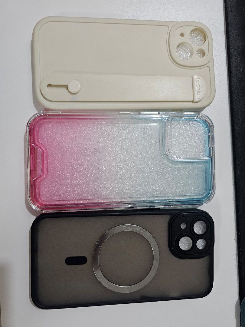 iphone 14 (Category: iPhone 14 Series) located in Santo Tomas. Submitted by buybugs (Listing ID 1465550352, Image 3). Description: - Model: Apple iPhone 14 - Color: White / Starlight - Battery Health: 100% capacity - Condition: Excellent, smooth physical appearance - Inclusions: screen protector, original box and cable - 3 free phone cases (beige with strap, gradient pink/blue, and black magnetic case).