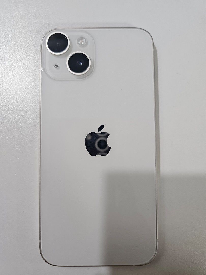 iphone 14 (Category: iPhone 14 Series) located in Santo Tomas. Submitted by buybugs (Listing ID 1465550352, Image 1). Description: - Model: Apple iPhone 14 - Color: White / Starlight - Battery Health: 100% capacity - Condition: Excellent, smooth physical appearance - Inclusions: screen protector, original box and cable - 3 free phone cases (beige with strap, gradient pink/blue, and black magnetic case).