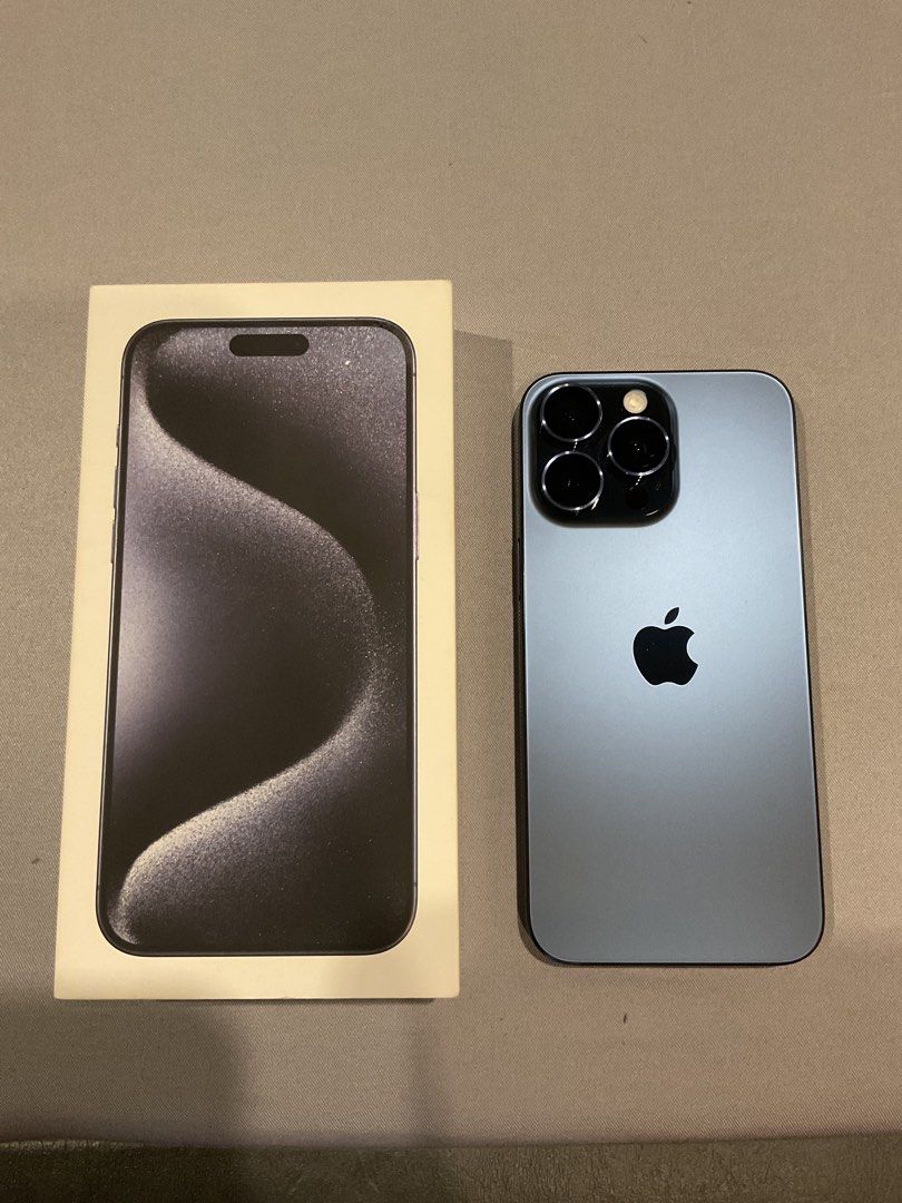 iPhone 15 Pro Max (Category: iPhone 15 Series) located in Paranaque City. Submitted by roschhh (Listing ID 1465429514, Image 2). Description: iPhone 15 Pro Max Titanium Blue - Openline - 87% Battery Health 456 CC - 9.5/10 Cosmetics - No dents/scratches - Issue: Only issue is physical sim can’t be detected, esim 100% working - Complete with box and charger - Never been opened/repaired - With free cases worth 5k .