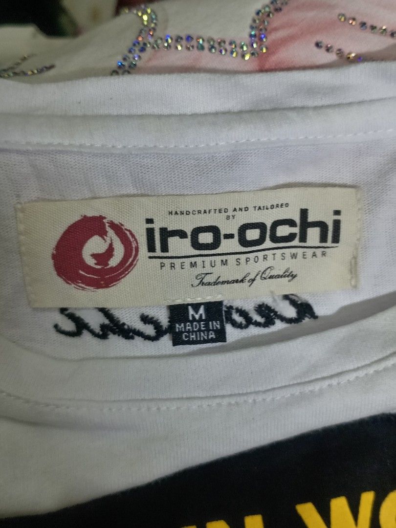 Iro-Ochi 'Rise From Below' Graphic Tee White Size M (Category: Tshirts & Polo Shirts ) located in Aguinaldo. Submitted by ukayandthrift (Listing ID 1465386531, Image 3). Description: - Brand: Iro-Ochi - Color: White - Size: Medium (tagged at inner collar) - Design: Large front graphic with skeleton hand, snake, skull, and 'Rise From Below' text - Details: 'Real Eyes Realize Real Lies' printed along the bottom edge - Fit: Short sleeves, classic cr