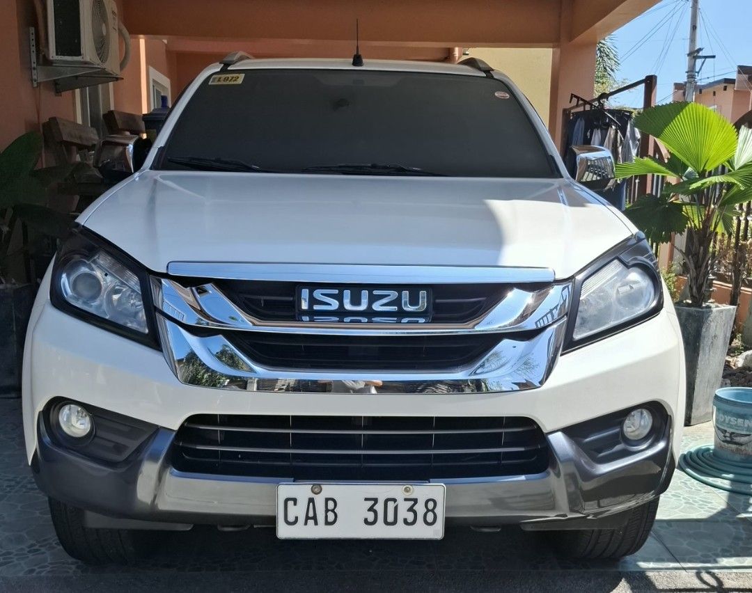 Isuzu Mu-X (Category: Used Cars) located in Manila. Submitted by swiftpenguin.2c632e (Listing ID 1465488715, Image 1). Description: FOR SALE :2017 ISUZU MU-X 4X2 LS-A MT (PEARL WHITE BODY COLOR) 720,000.00 (Negotiable upon viewing) Direct Owner/49000 km ONLY (Fresh/Low Mileage/Fresh CASA PMS/Complete Service History. Newly Installed Tint Newly procured battery One year old Goodyear tires (R17) with 5 years warranty. New LTO REGISTRATION TARLAC CI