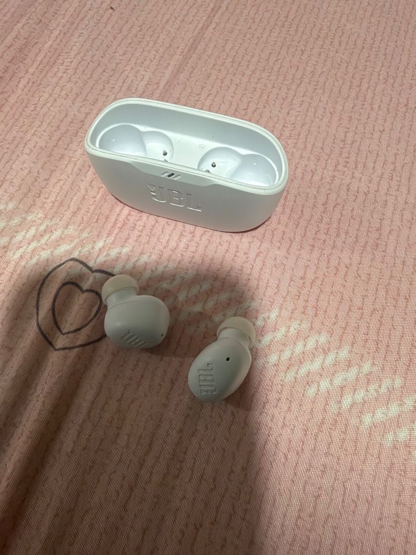 JBL White True Wireless Earbuds with Charging Case (Category: Earphones) located in Manila. Submitted by geoliven159q (Listing ID 1465394731, Image 3). Description: - Authentic JBL wireless earbuds in classic white - Compact charging case included for snug and secure storage - Delivers crisp, good sound quality with a portable design - Hassle-free Bluetooth pairing with smartphones and laptops - Convenient charging via standard USB port - Perfect