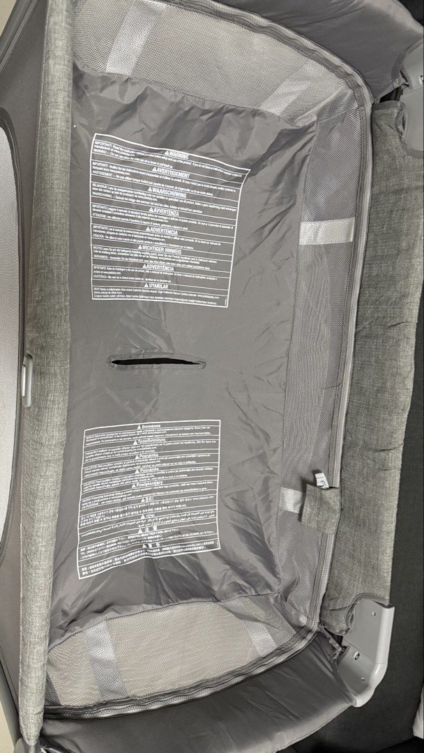 Joie Grey Portable Baby Cot Playpen (Category: Cots & Cribs) located in Paranaque City. Submitted by aneevesereth (Listing ID 1465540326, Image 2). Description: Joie portable baby cot in grey. Mesh sides for good airflow and visibility. Easy to fold and pack away into the included travel bag. Includes a padded foldable mattress base. Great for naps at home or travelling. Clean condition overall, setup and ready to use. No stain inside, no issue w