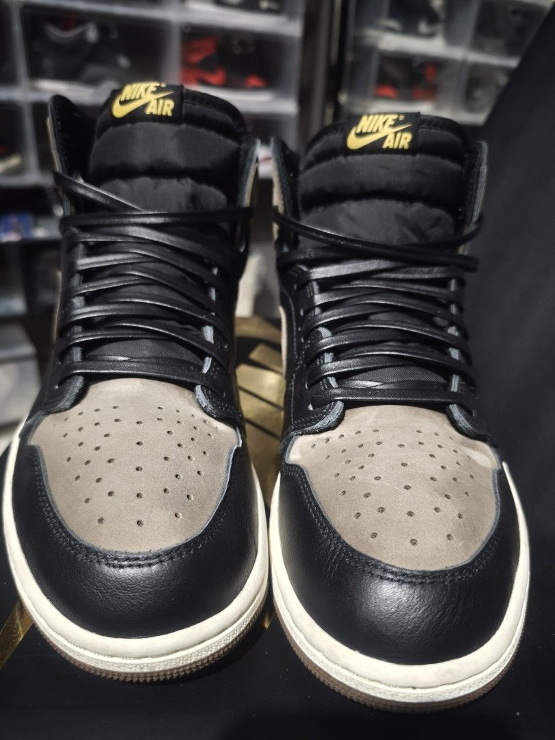Jordan 1 Retro High OG Palomino (Category: Sneakers) located in Marikina City. Submitted by ahegaosenpai (Listing ID 1465507211, Image 3). Description: - Air Jordan 1 Retro High OG Palomino - Black Leather and Brown Suede - Size: US 11, Euro 45, UK 10, 29cm - Includes original box -From Snkrs App -9/10 condition -Ugraded to Leather laces.